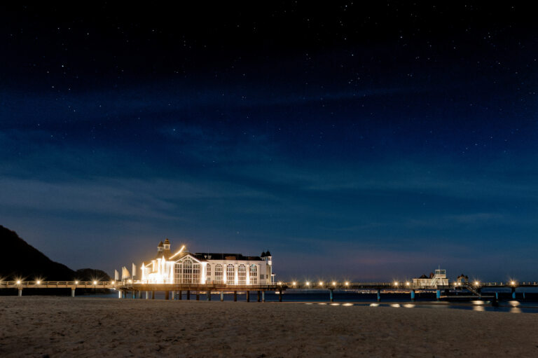 Baltic resort Sellin pier at night with starry sky