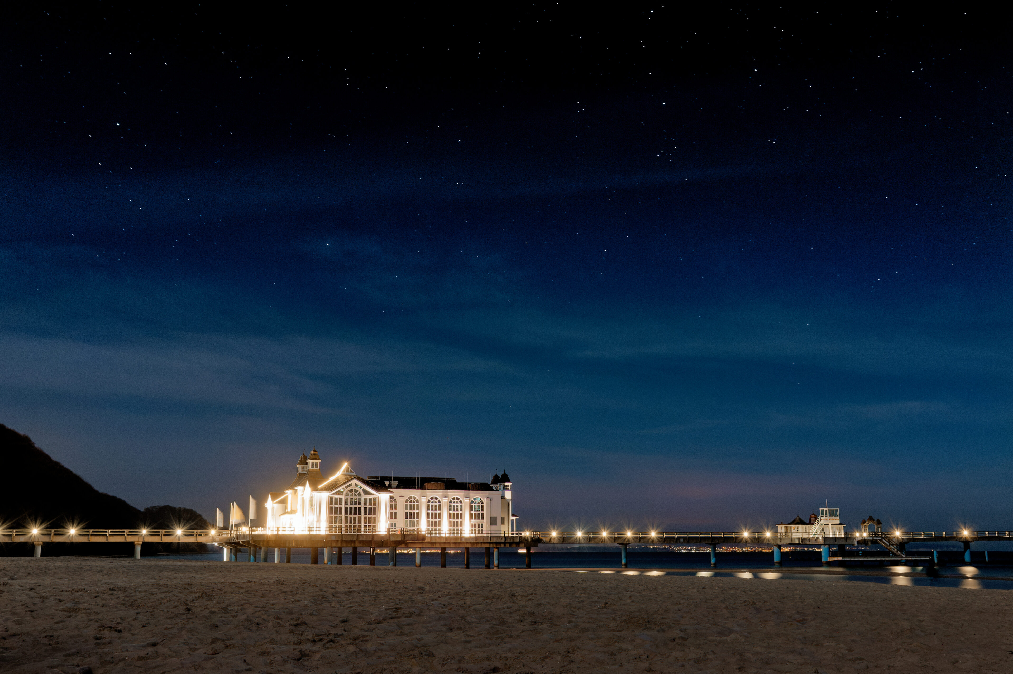 Baltic resort Sellin pier at night with starry sky